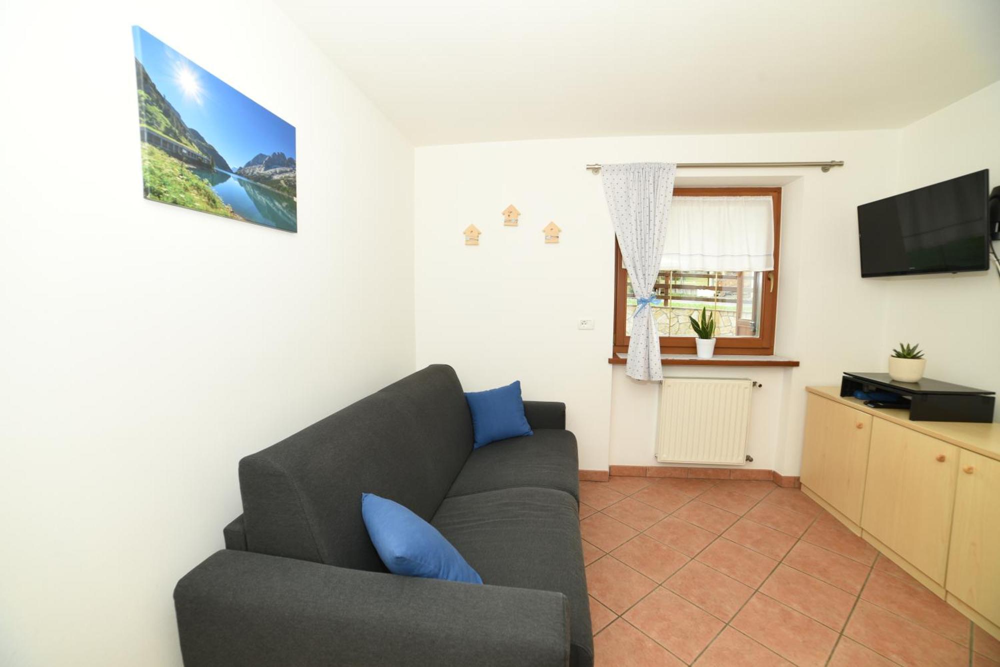 Appartement Cesa Mandi E Miky à Canazei Extérieur photo