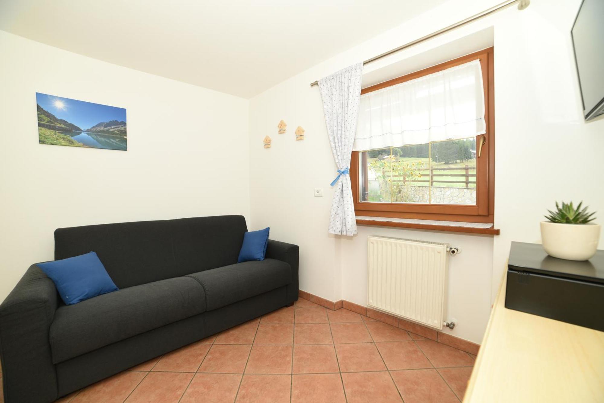Appartement Cesa Mandi E Miky à Canazei Extérieur photo